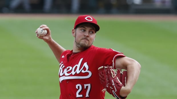 Sep 14, 2020; Cincinnati, Ohio, USA; Cincinnati Reds starting pitcher Trevor Bauer (27) throws against the Pittsburgh Pirates in the first inning during Game One of a doubleheader at Great American Ball Park. Mandatory Credit: David Kohl-USA TODAY Sports